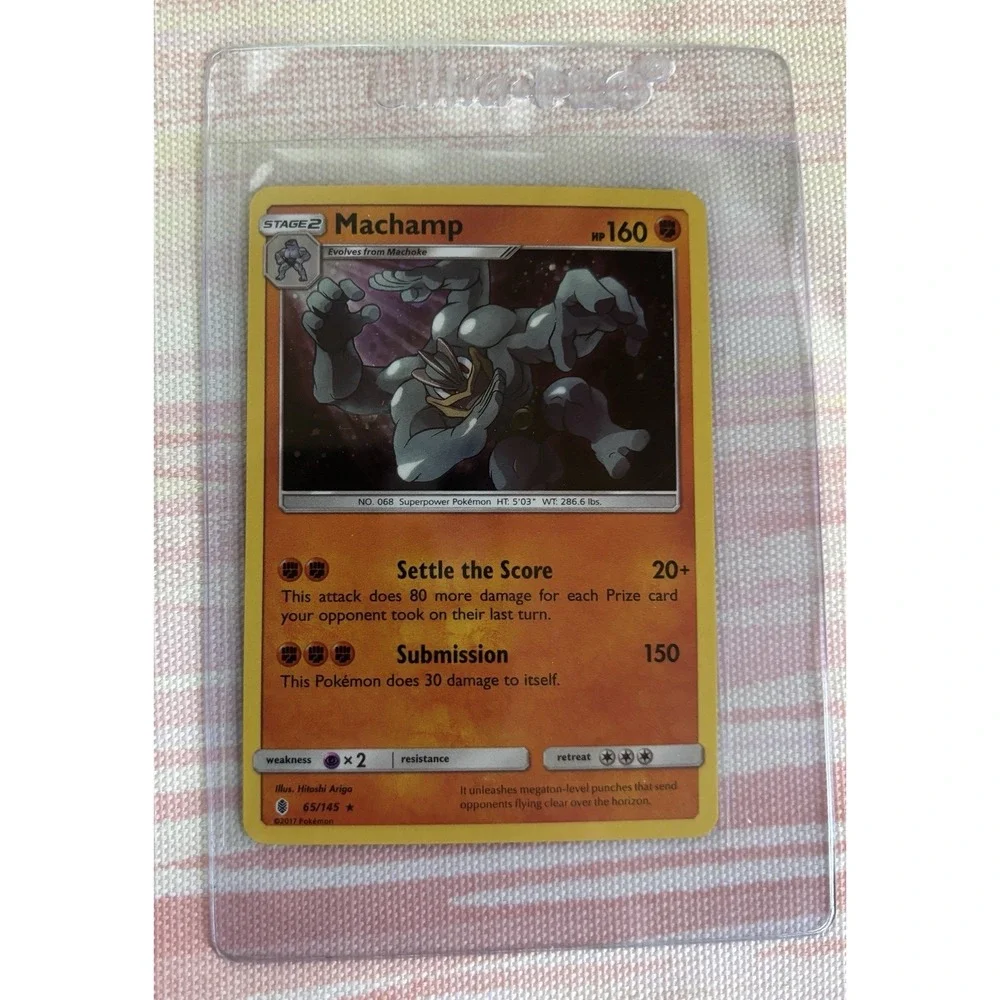 Pokémon TCG Machamp 65/145 Cosmos Holo rare card from the 2017 Guardians Rising